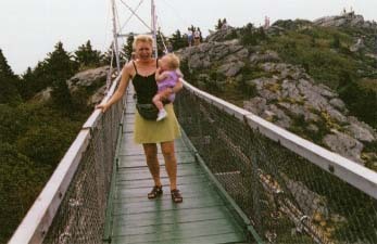 A woman walking over a bridge is seized by intense fear. Owen Franken/Corbis