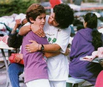 Some people develop post-traumatic stress disorder after living through terrifying events. Here, a mother comforts her son at a Red Cross shelter after the Northridge, California, earthquake of January 21, 1994. Corbis/Reuters.