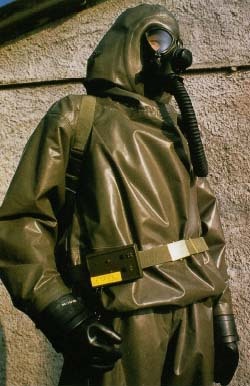 An ambulance worker wears protective gear against radiation exposure. In the event of a nuclear power station accident or in wartime, the suit would provide protection against radioactive fallout, and the mask and backpack would provide for air filtration. Javier Pierini/Science Photo Library/Photo Researchers, Inc.