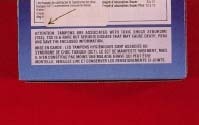 The outer packaging of a tampon box shows a warning about Toxic Shock Syndrome. © Leonard Lessin, Peter Arnold, Inc.
